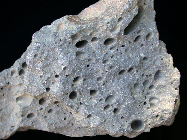 What is an an igneous rock that contains vesicles?