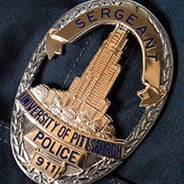 a Pitt police badge