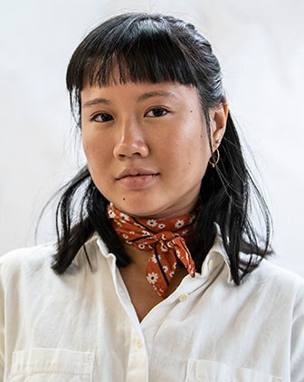 Headshot of Karen Lue, against a white background.