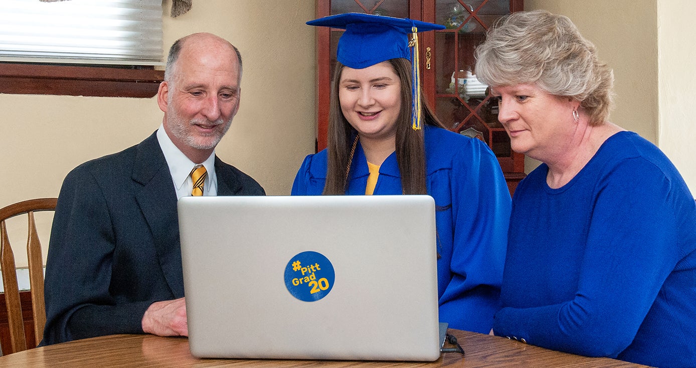 A family watches commencement together online