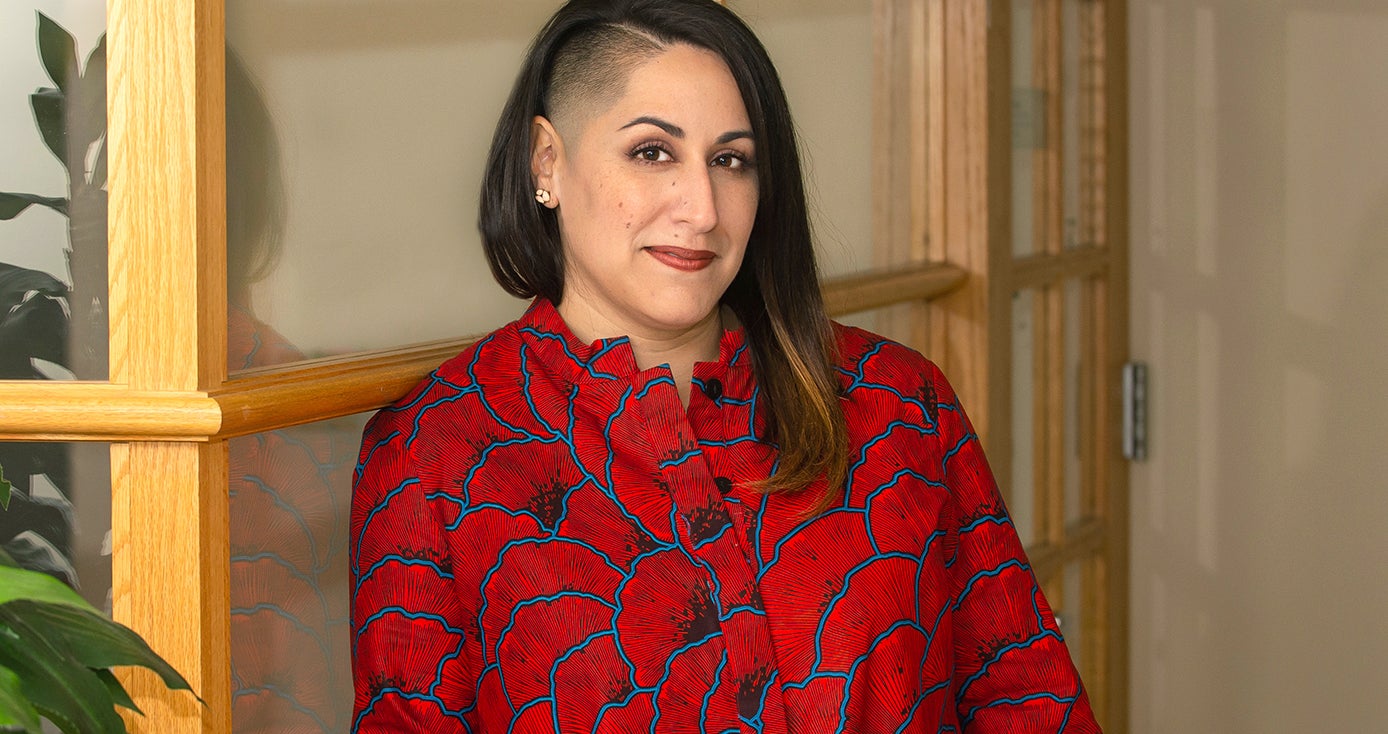 Carla Chugani in a red and blue patterned blouse 