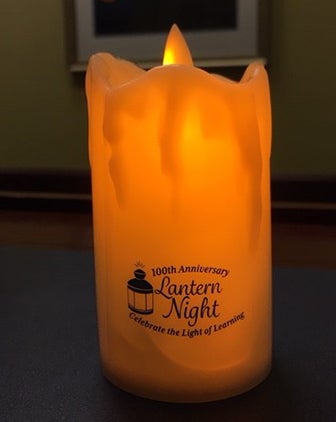 a glowing LED candle that says 100th anniversary of Lantern Night