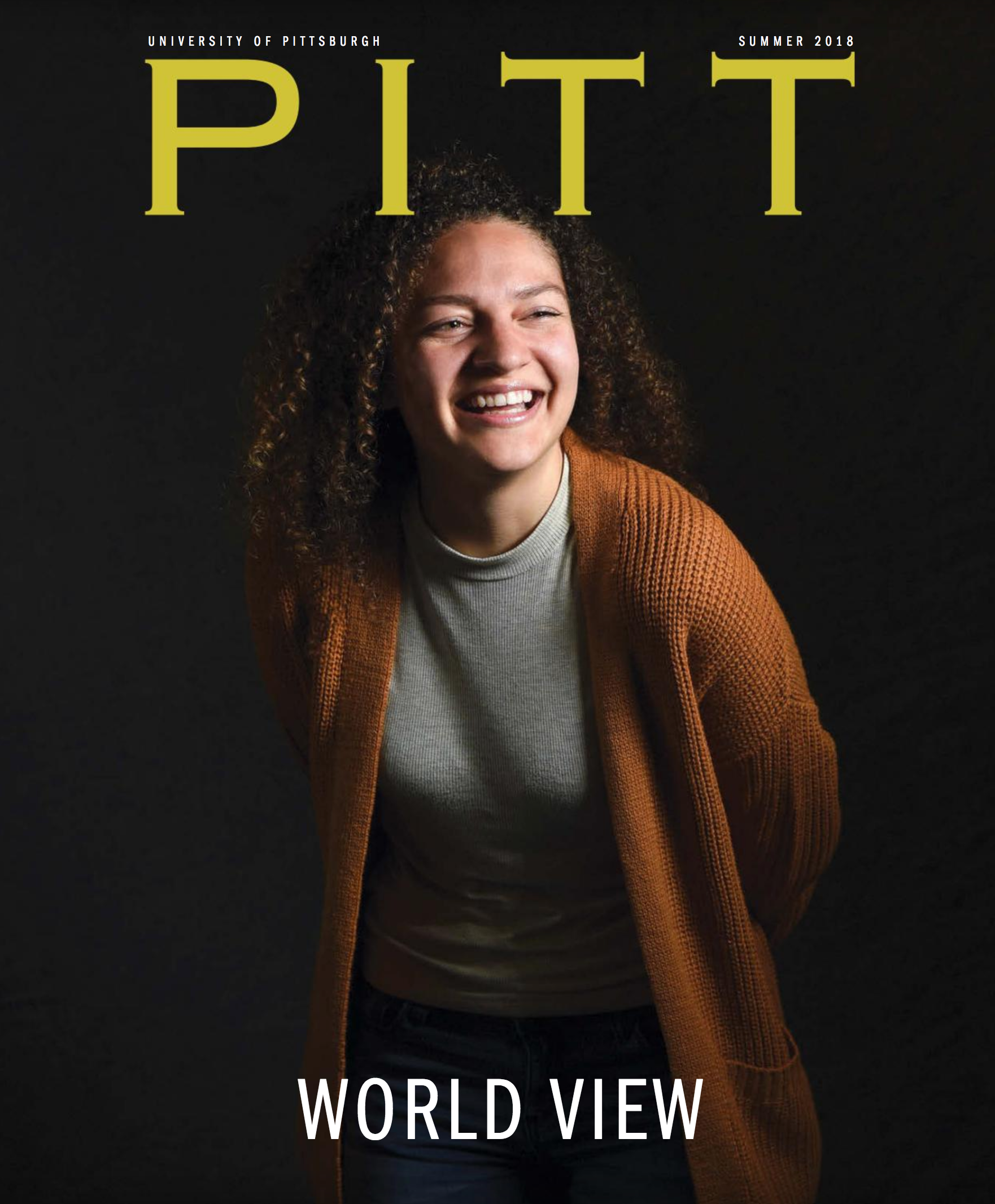 cover of the issue, which features a young smiling woman in a rusty colored sweater