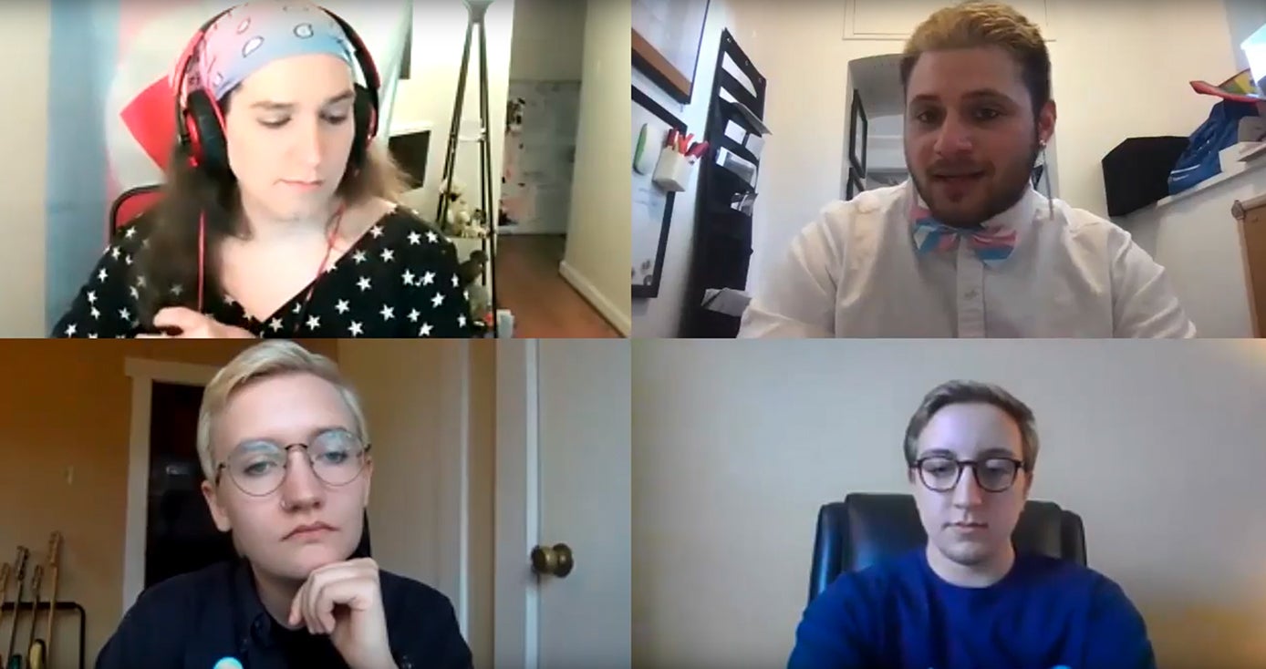 A Zoom meeting with four visible participants