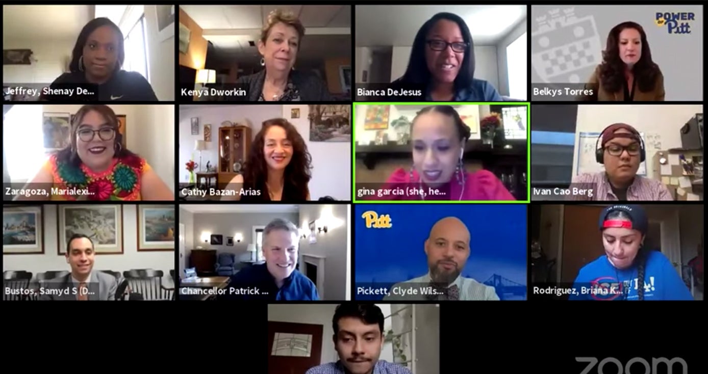A Zoom call with 13 visible participants