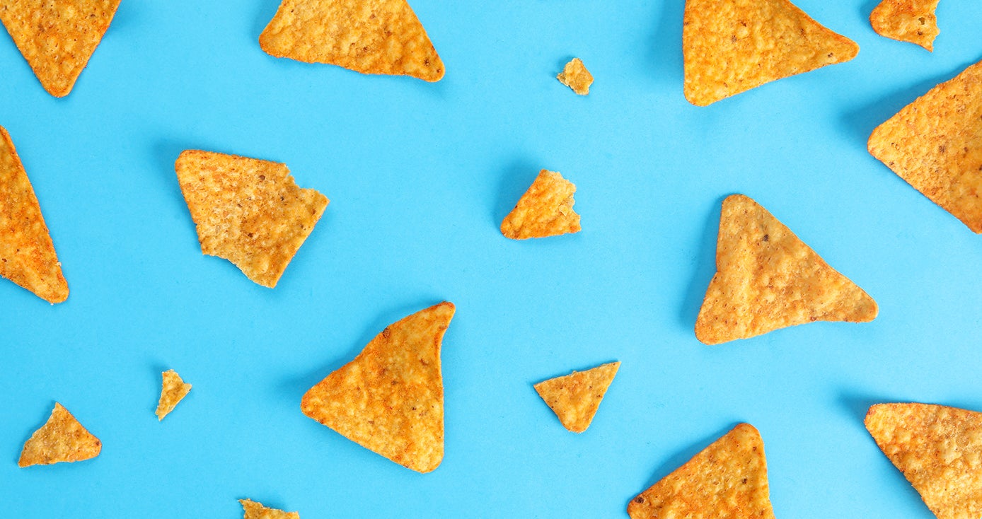triangle chips that look like Doritos spread out on a blue background