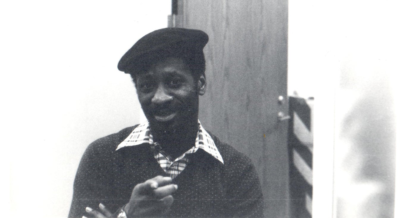 Black and white image of Rob Penny pointing at the camera.