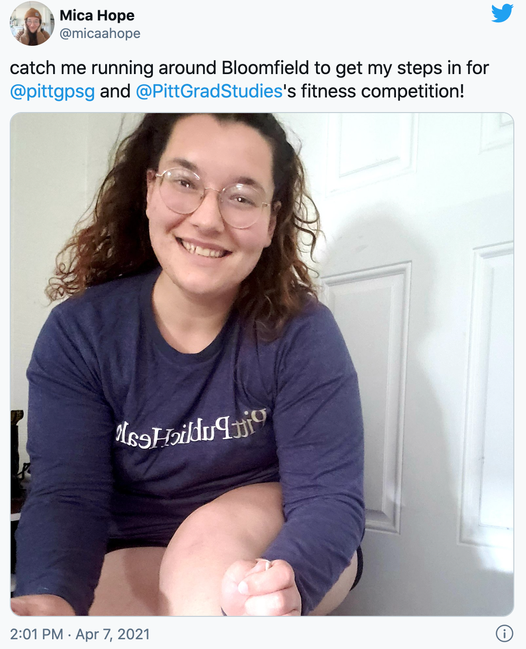 a screenshot of a tweet by @micahope that says "catch me running around Bloomfield to get my steps in for @pittgpsg and @PittGradStudies's fitness competition!"