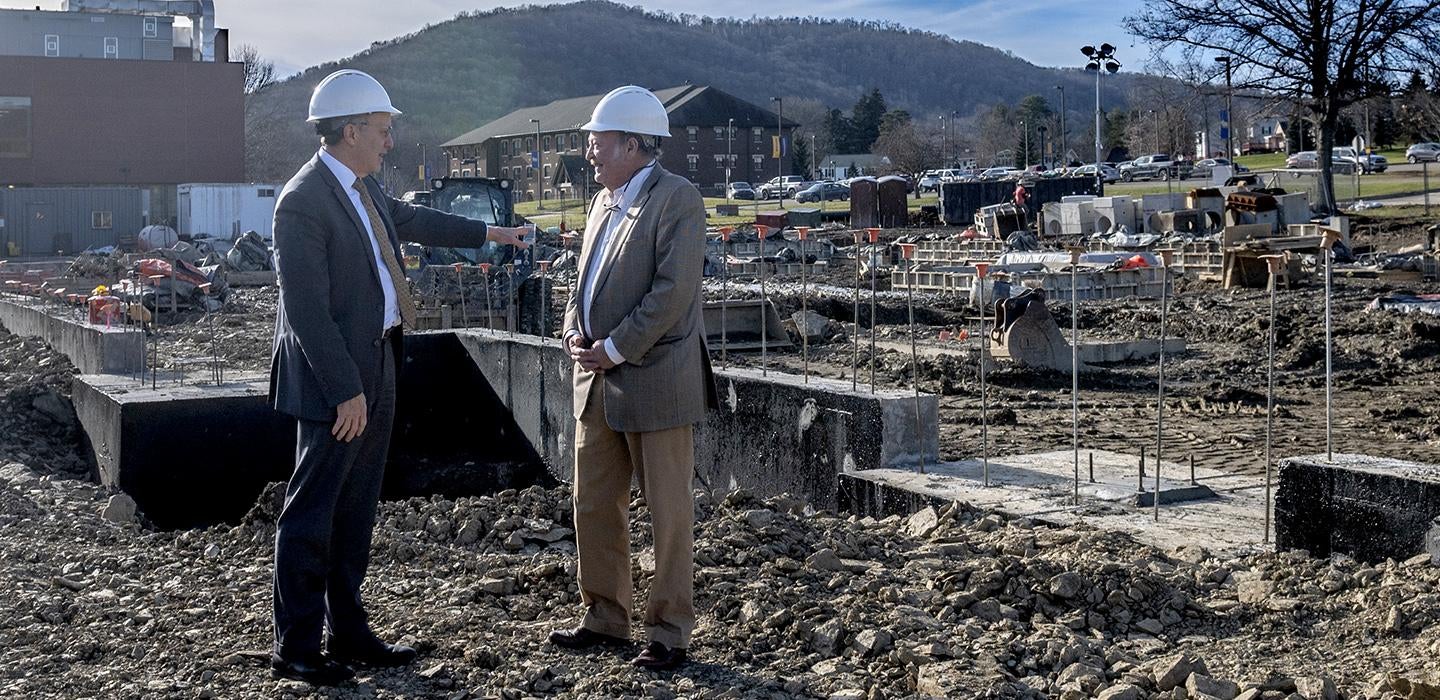 Rick Esch and George B. Duke at construction site