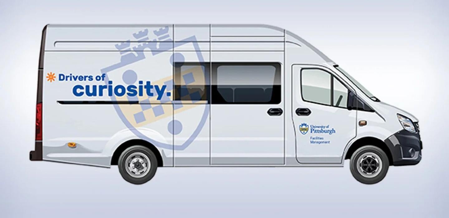 A van with a Pitt logo on the side
