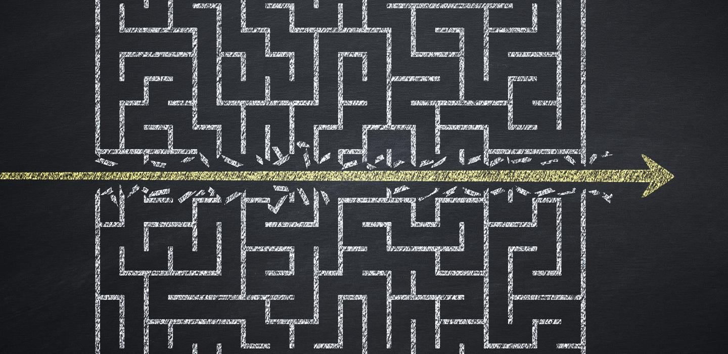 a maze with an arrow blasting through the barriers
