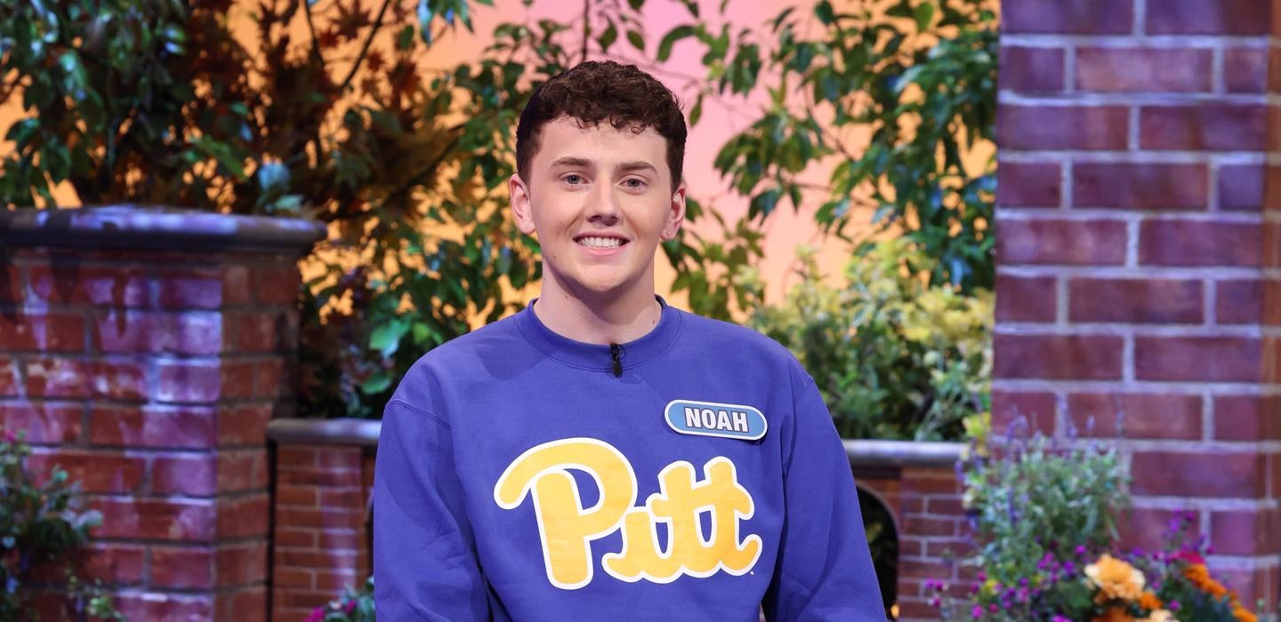 Stockwell in a Pitt shirt on the Wheel of Fortune set