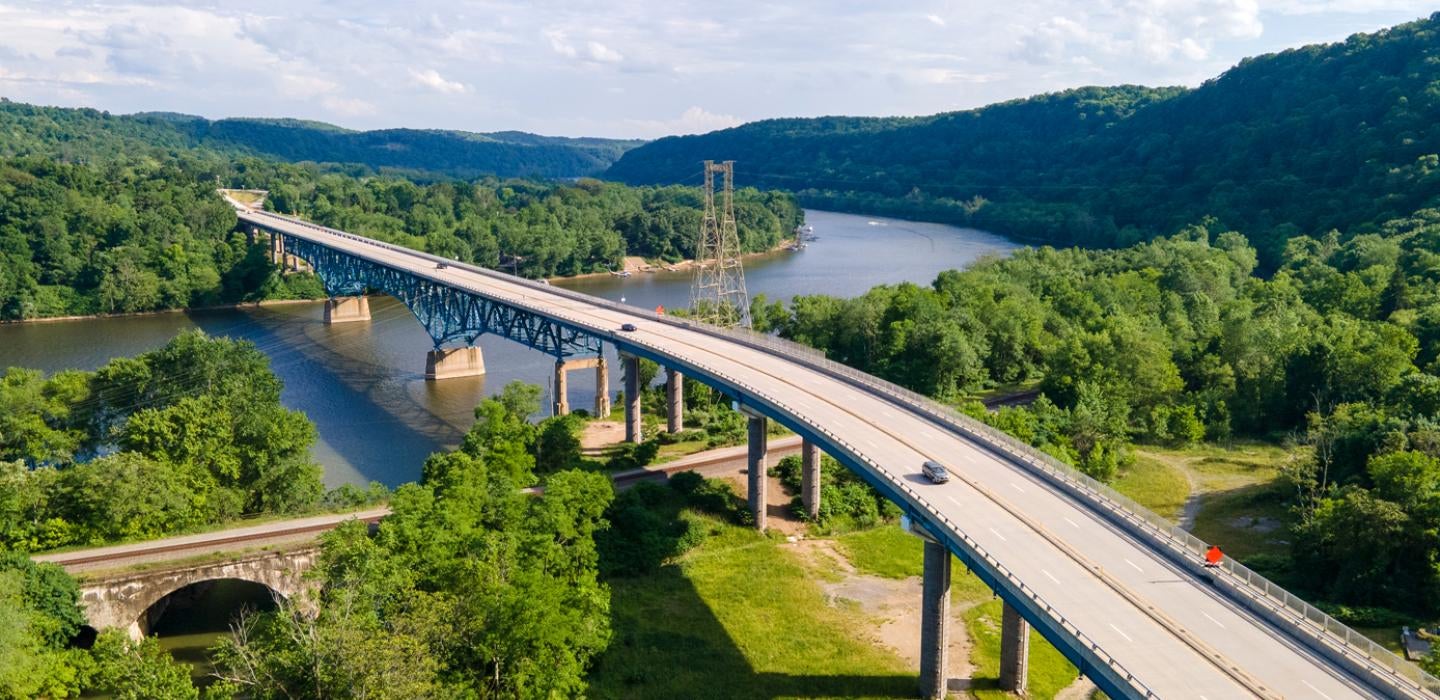 Overhead image of a bridge over a river