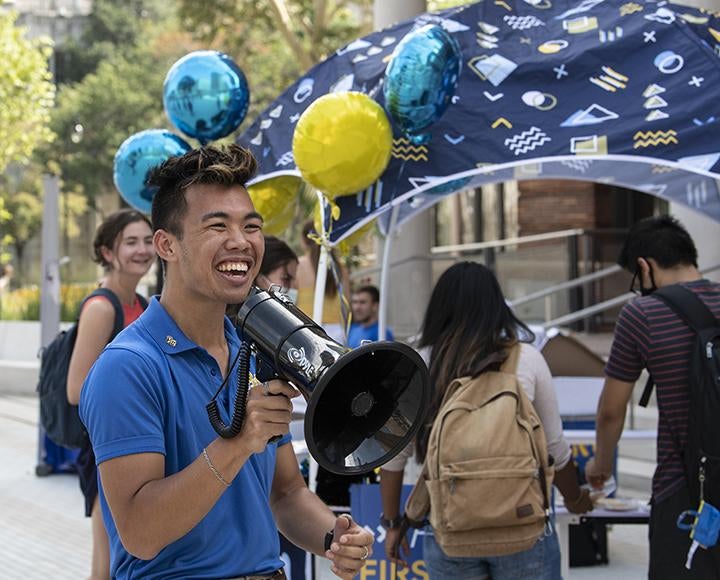 Tommy Nguyen with megaphone