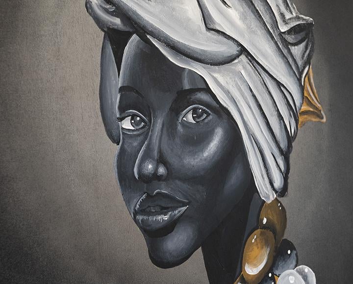 Black, white and gold painting of woman's face