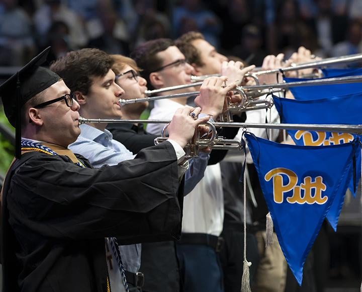 Pitt band members playing instruments during ceremony