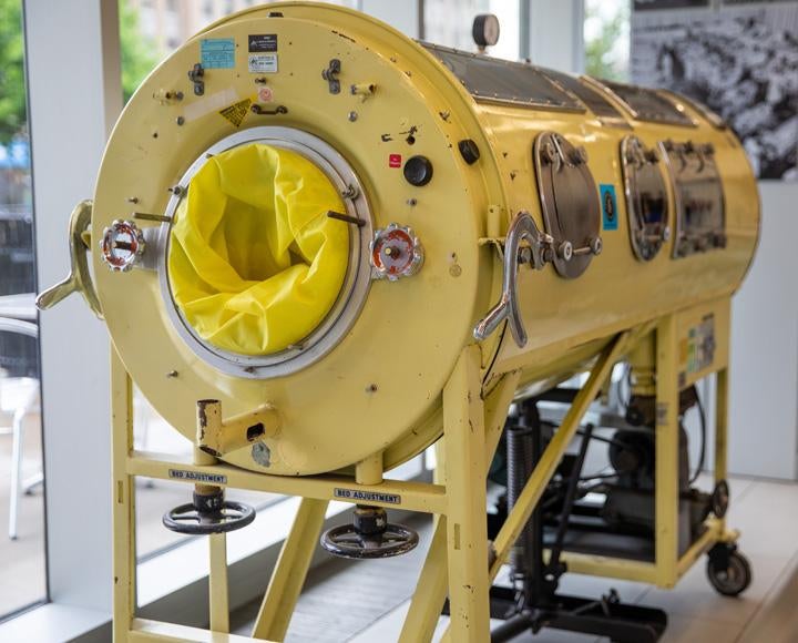 a bright yellow iron lung
