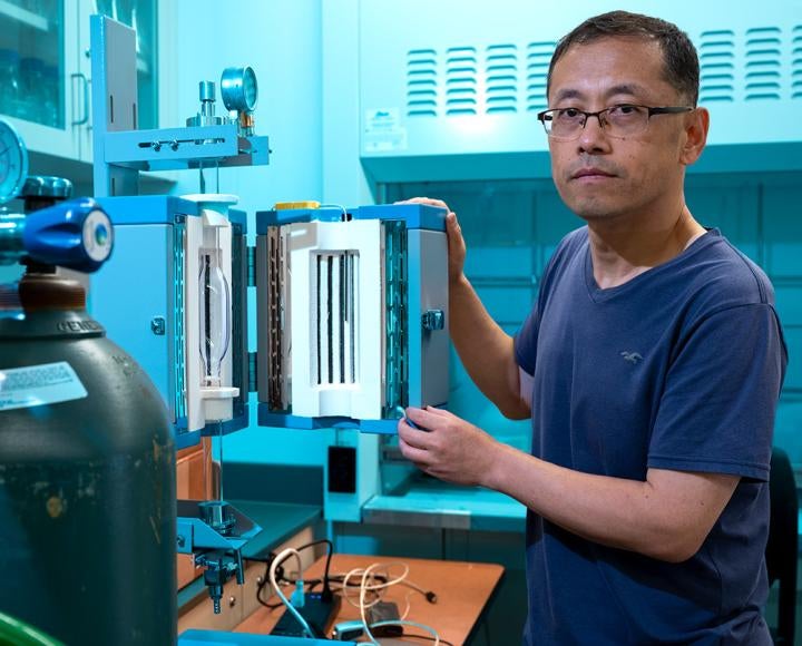 Liu works on a machine