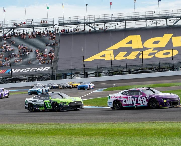 Cars race during a NASCAR event at the Indianapolis Motor Speedway