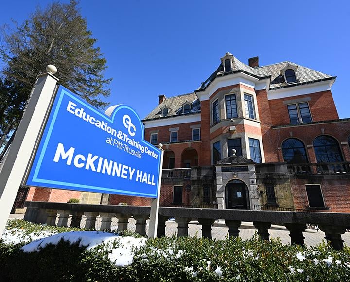 A newly branded sign marks McKinney Hall at Pitt-Titusville