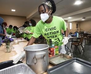 Pitt volunteers preparing food during Civic Action Week