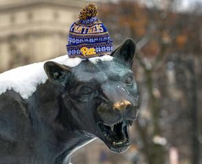 panther statue with a Pitt hat on top
