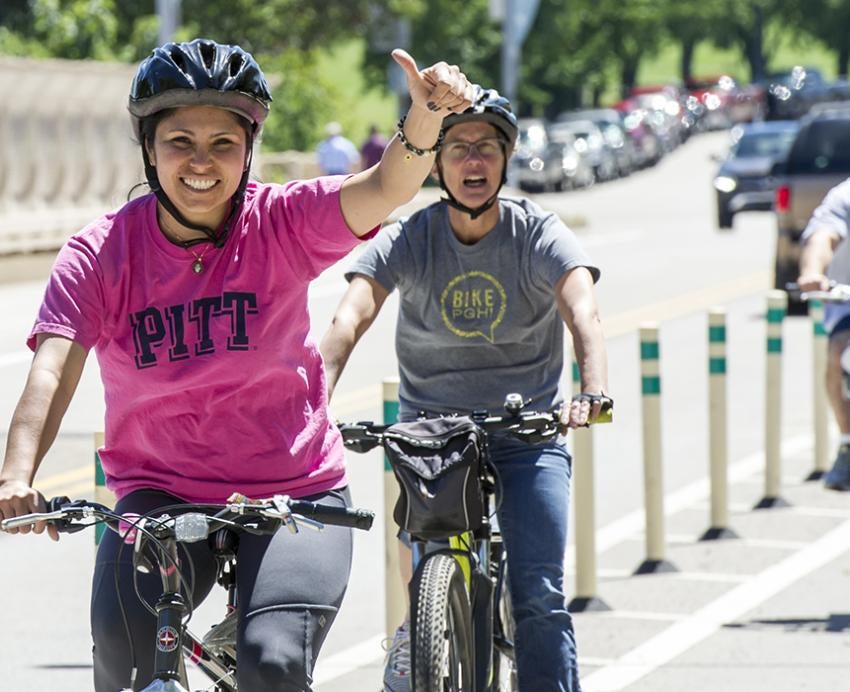 Pitt bicyclists riding around Oakland