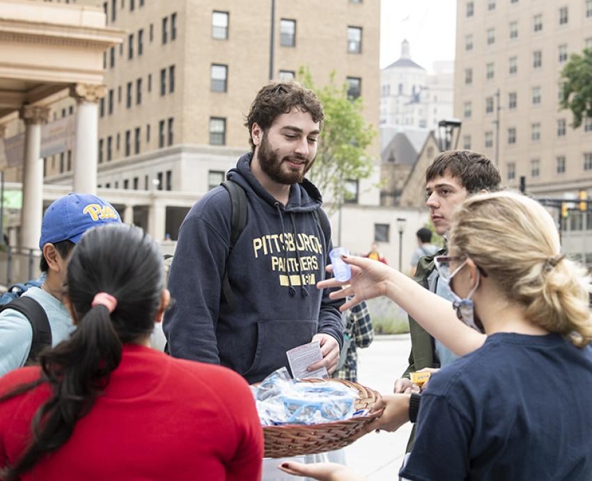Students wearing Pitt attire at the Safety Fair