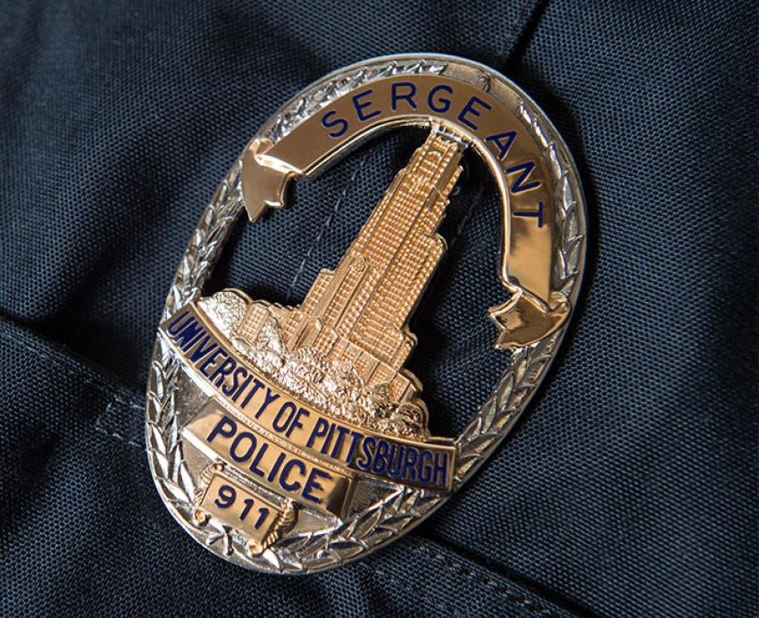 a Pitt Police badge