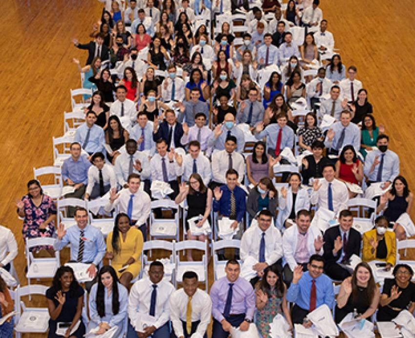 med school students seated in chairs