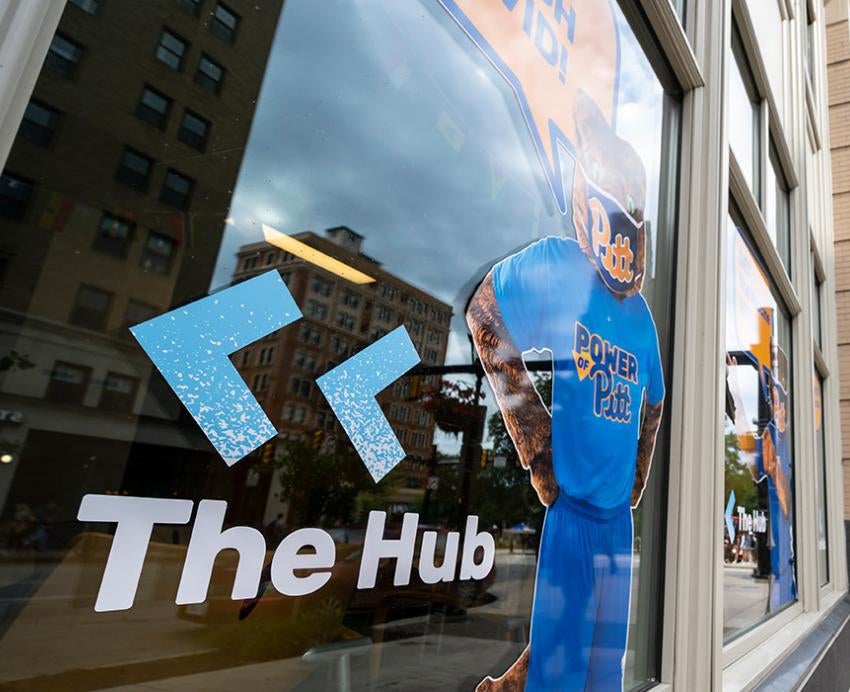 A decal of Roc wearing a mask on The Hub windows