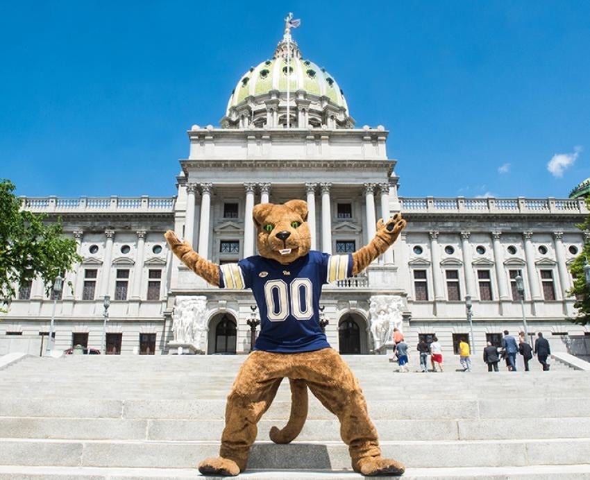 Roc the Panther poses in front of the Pennsylvania Capitol Building