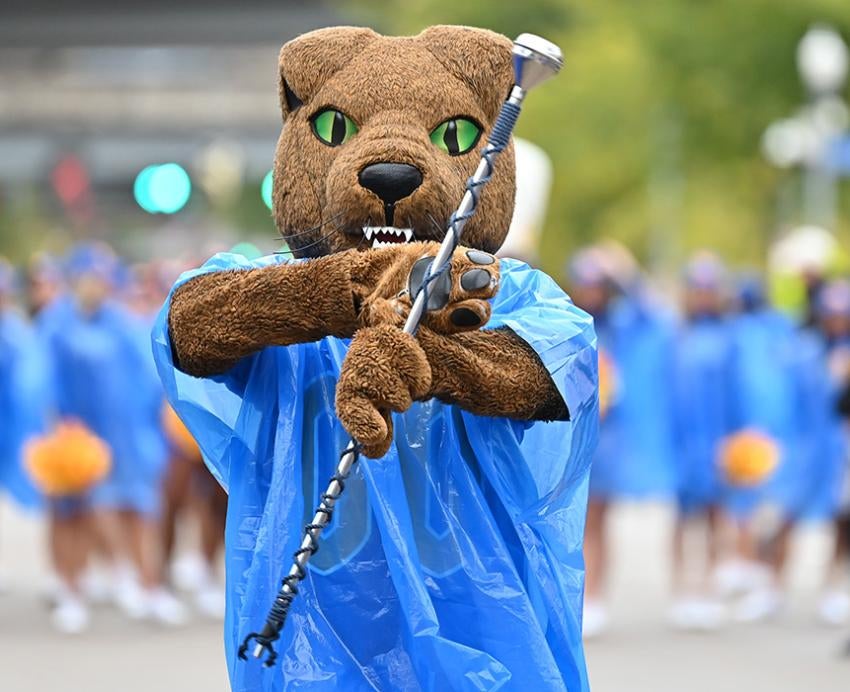 Roc the panther mascot spins a baton