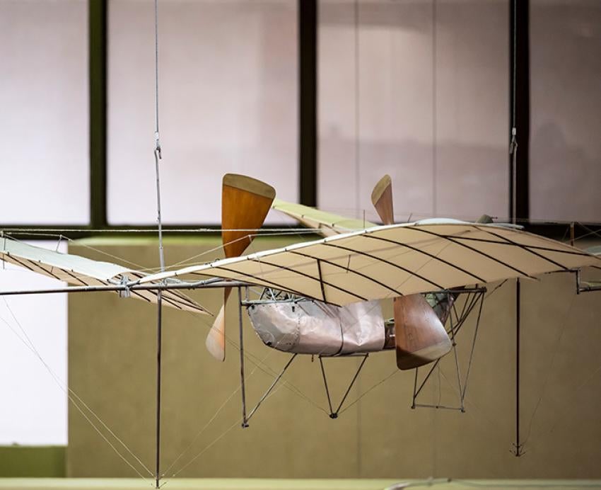 A model of an aircraft suspended from a ceiling