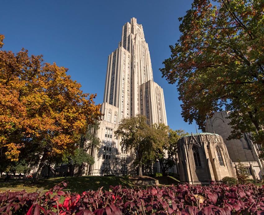 The Cathedral of Learning surrounded by autumnal leaves