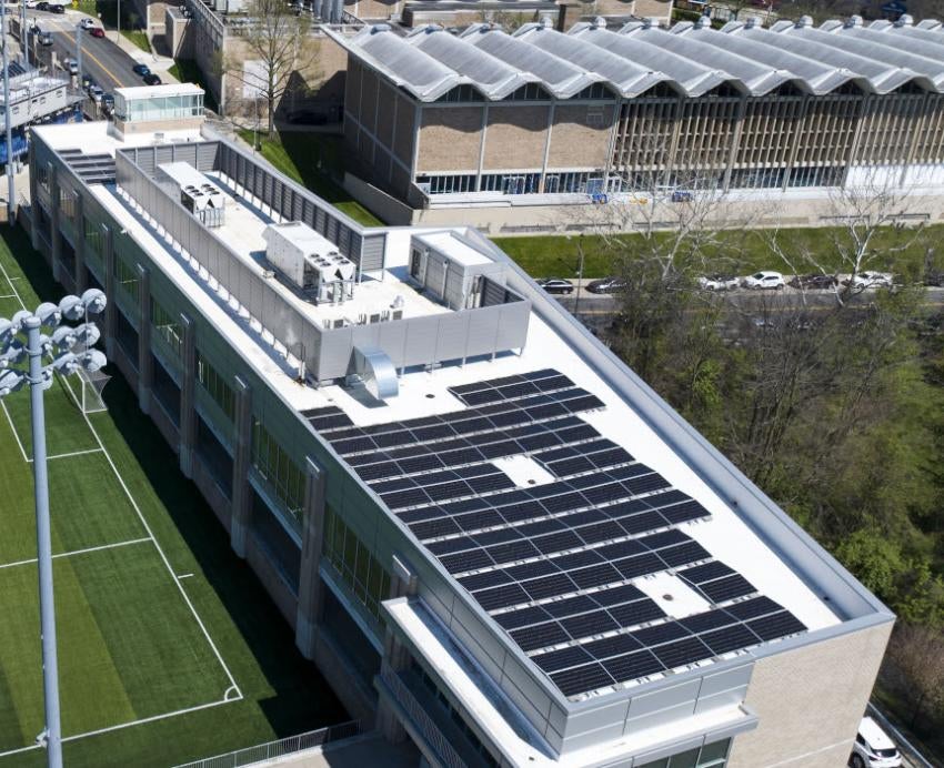 Aerial view of the Petersen Events Center, with rooftop solar panels 