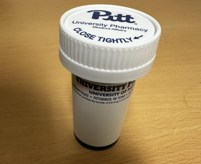 A Pitt-branded prescription bottle