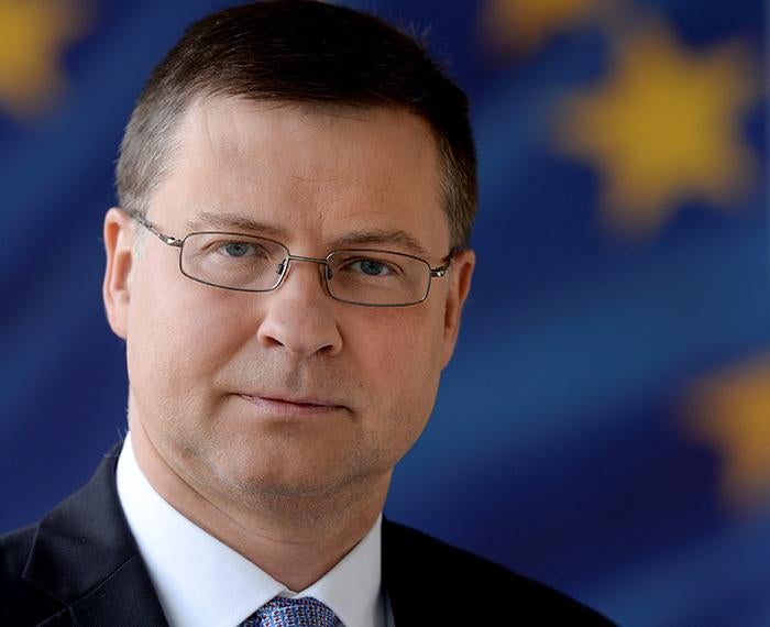 Valdis Dombrovskis with black suit and blue tie