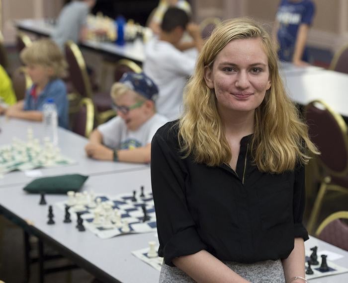 Ashley Priore posing for photo during chess tournament
