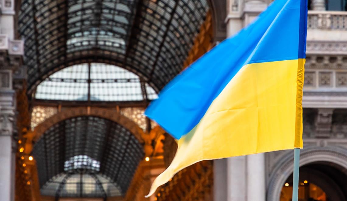 Ukraine flag in front of building
